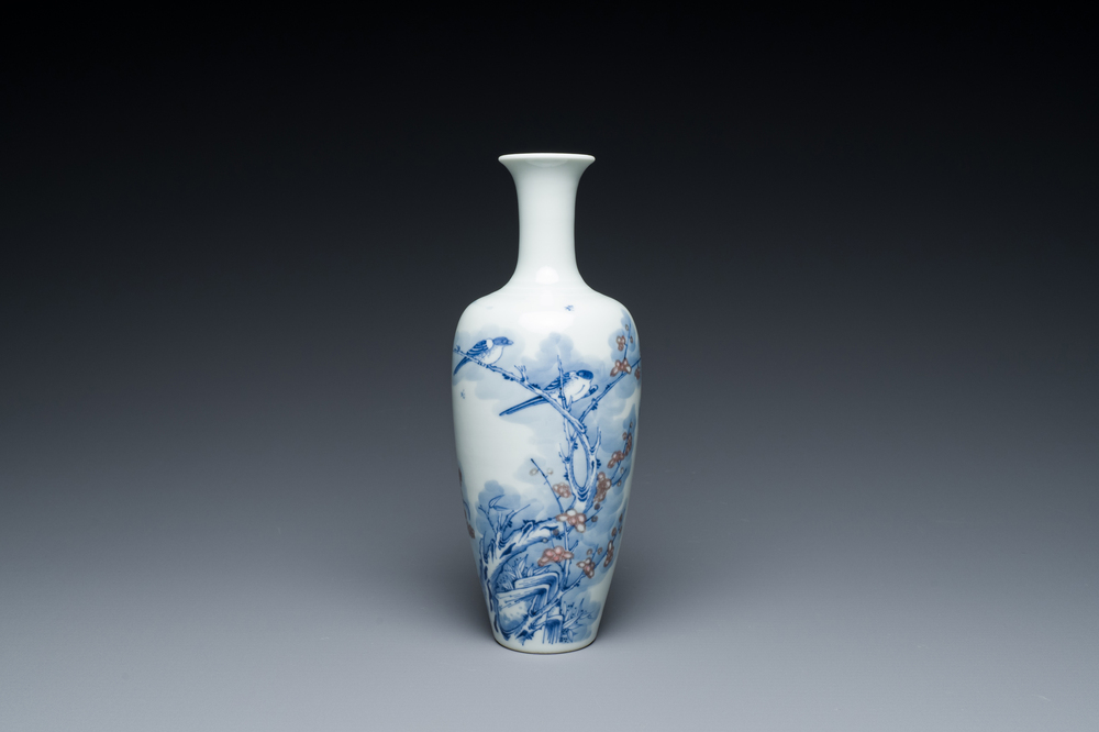 A Chinese blue, white and copper-red 'magpie and prunus' vase, Kangxi mark, 19/20th C.