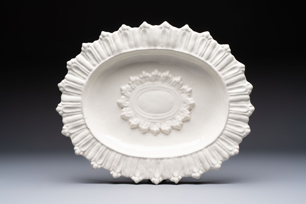 A large white-glazed 'Sunburst' oval dish, Saint-Jean-du-D&eacute;sert or Marseille, France, 17th C.