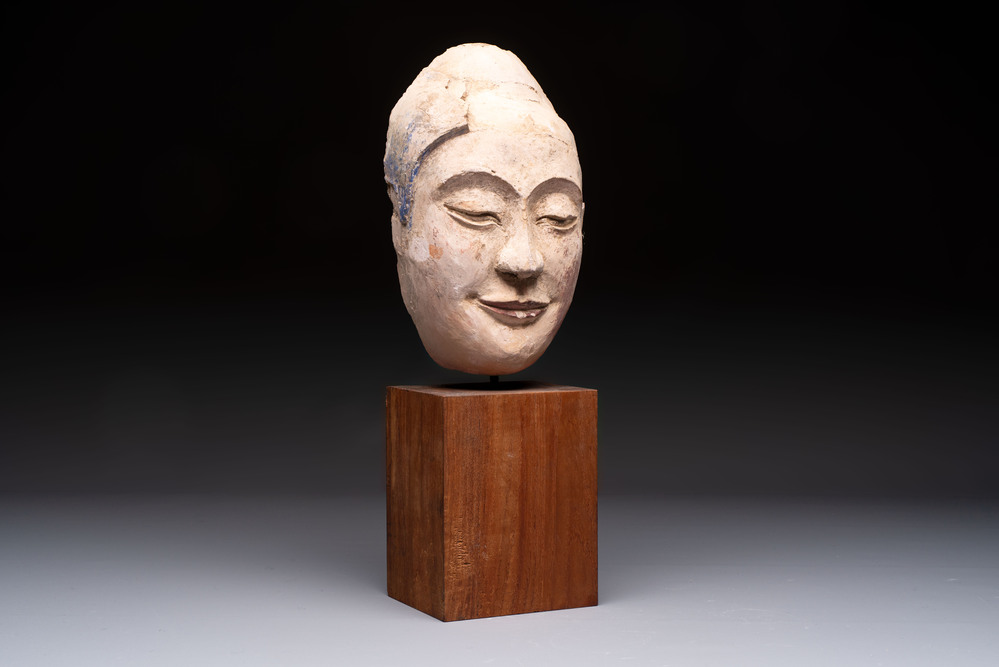 A Thai polychrome stucco head of Buddha, Ayutthaya Kingdom, 16/17th C.