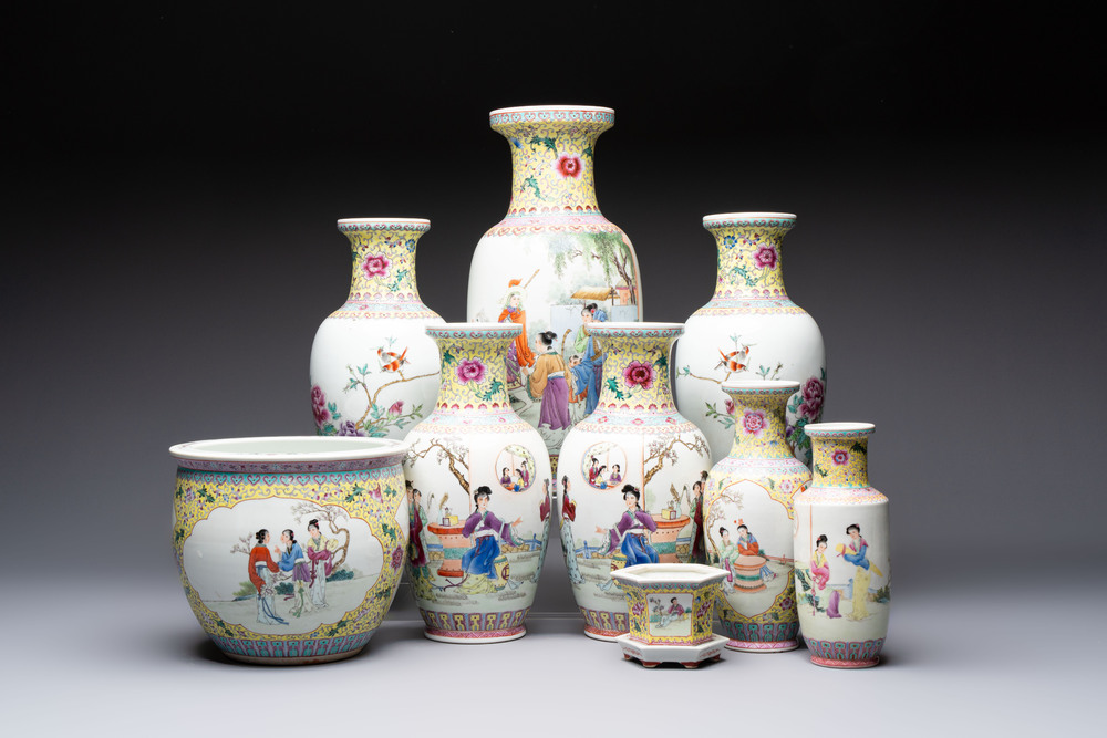 Seven Chinese famille rose vases, a scroll jar and a jardini&egrave;re on a stand, Qianlong marks, 20th C.