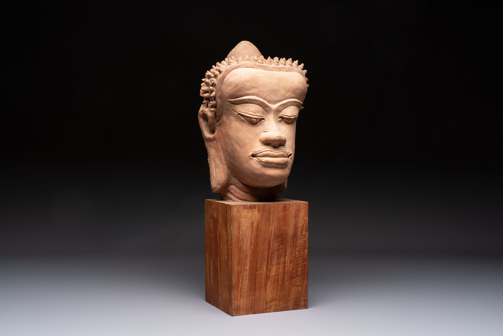 A Thai pottery Haripunjaya-style head of Buddha, possibly 13th C.