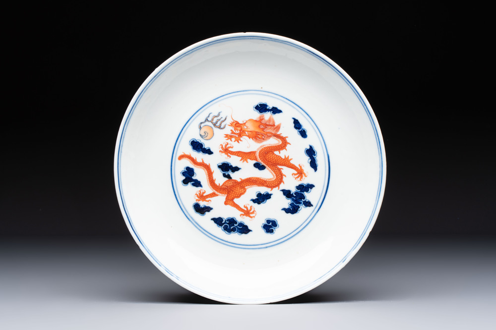 A Chinese blue and white iron-red-decorated 'Dragon' plate, Jing Jin Tang 精進堂 mark, 19th C.