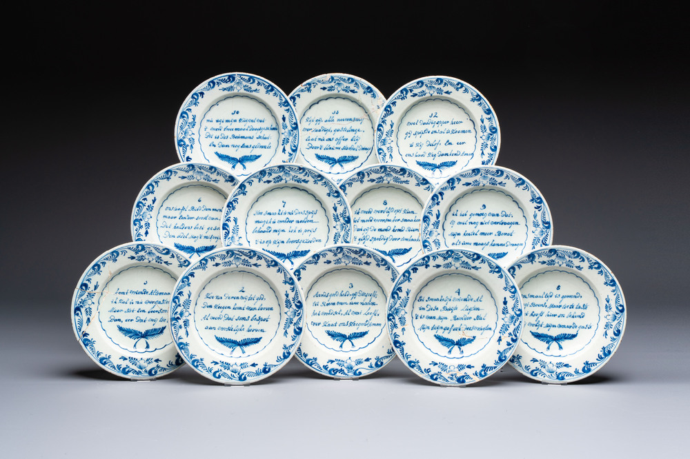 A set of 12 blue and white Dutch Delft 'Proverb' plates, 18th C.