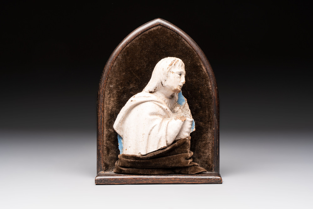 An Italian 'Luca Della Robbia'-style fragment of Saint John The Evangelist, 2nd half 15th C.