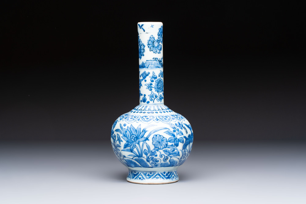 A Chinese blue and white bottle vase with floral design, hare mark, Wanli