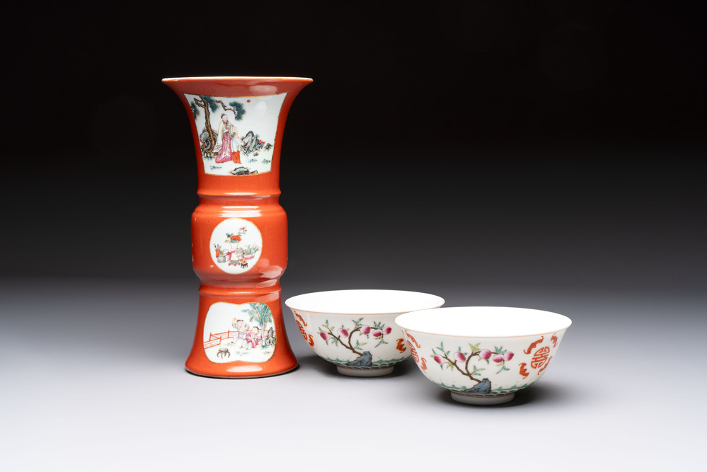 A Chinese famille rose coral-ground 'Gu' vase and a pair of 'Fu Lu Shou 福祿壽' bowls, Qianlong and Guangxu marks, 19th C.
