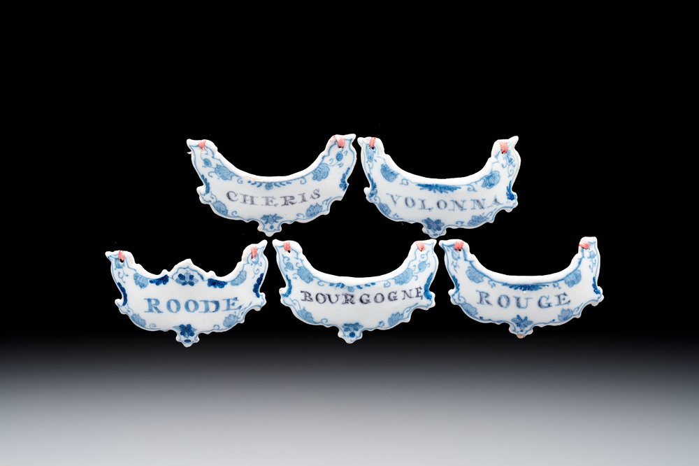 Five blue and white Dutch Delft 'Wine' labels, 18th C.