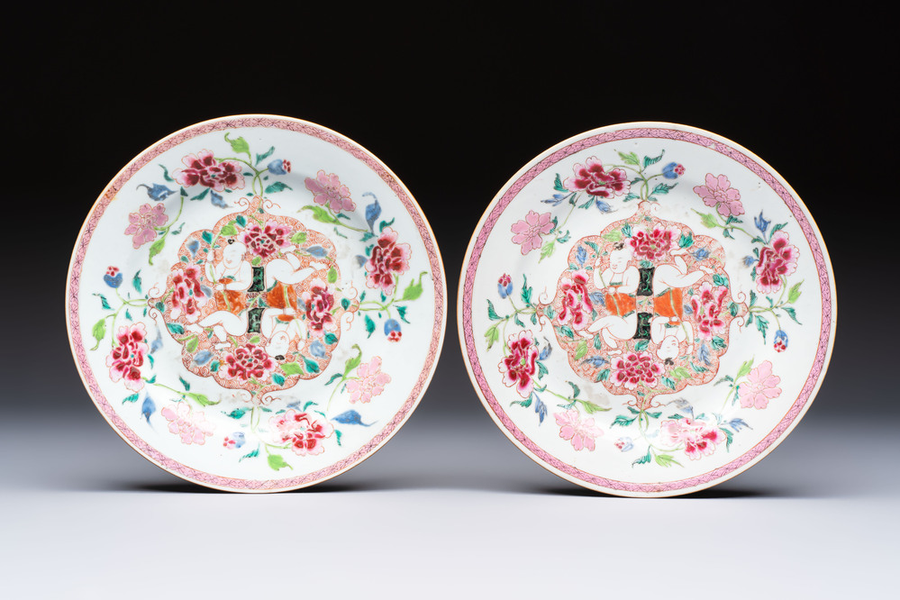 A pair of Chinese famille rose 'He He Er Xian' plates, Yongzheng/Qianlong