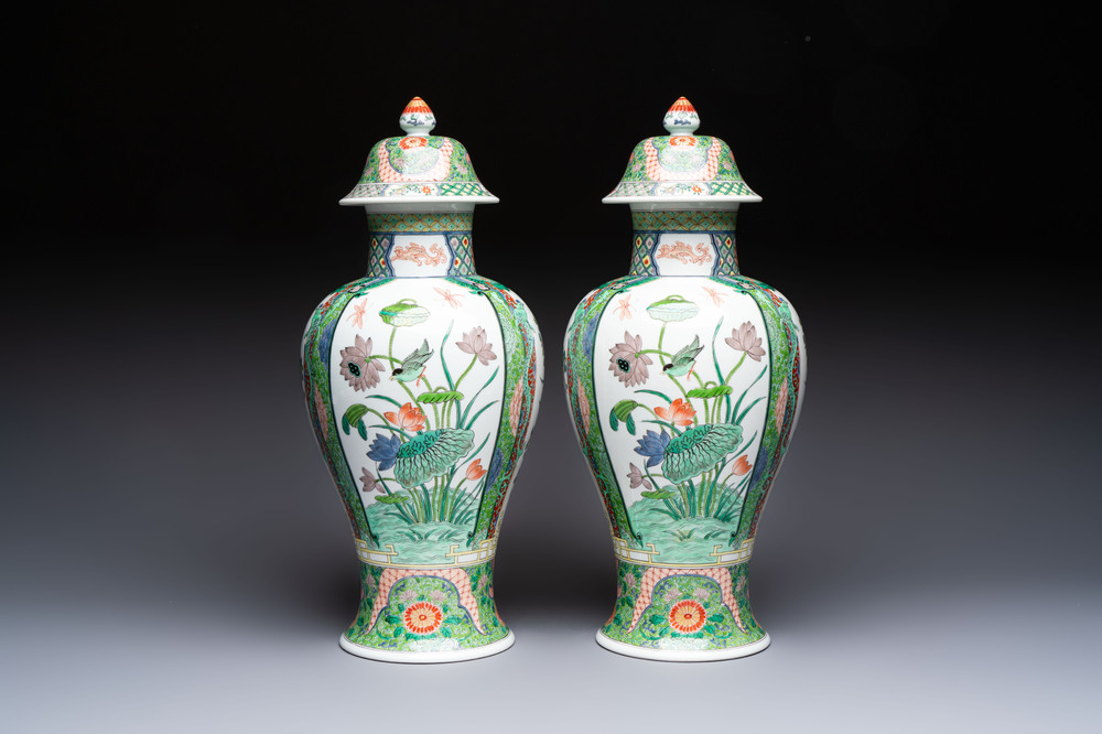 A pair of famille verte-style 'Lotus Pond and Flower Basket' vases and covers, Samson, Paris, 19th C.
