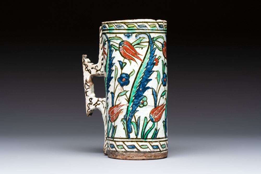 A polychrome Iznik mug, late 16th C.
