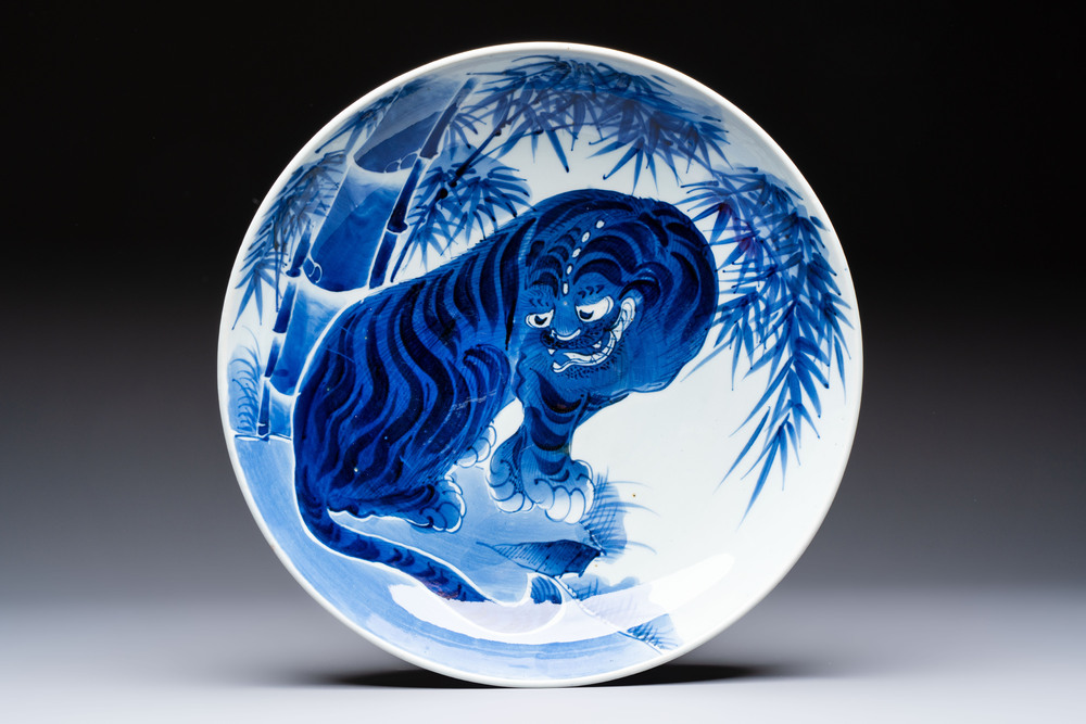 A large Japanese Arita blue and white 'Tiger' dish, Fuuki Chousun 富貴長春 mark, late Edo to early Meiji, 18/19th C.