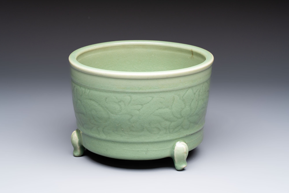 A large Chinese Longquan celadon tripod censer with floral design, Ming