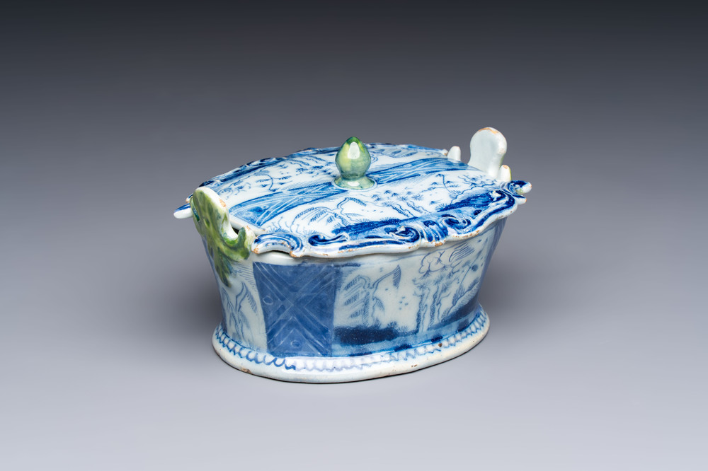 A blue and white Dutch Delft butter tub with green-glazed accents, 18th C.