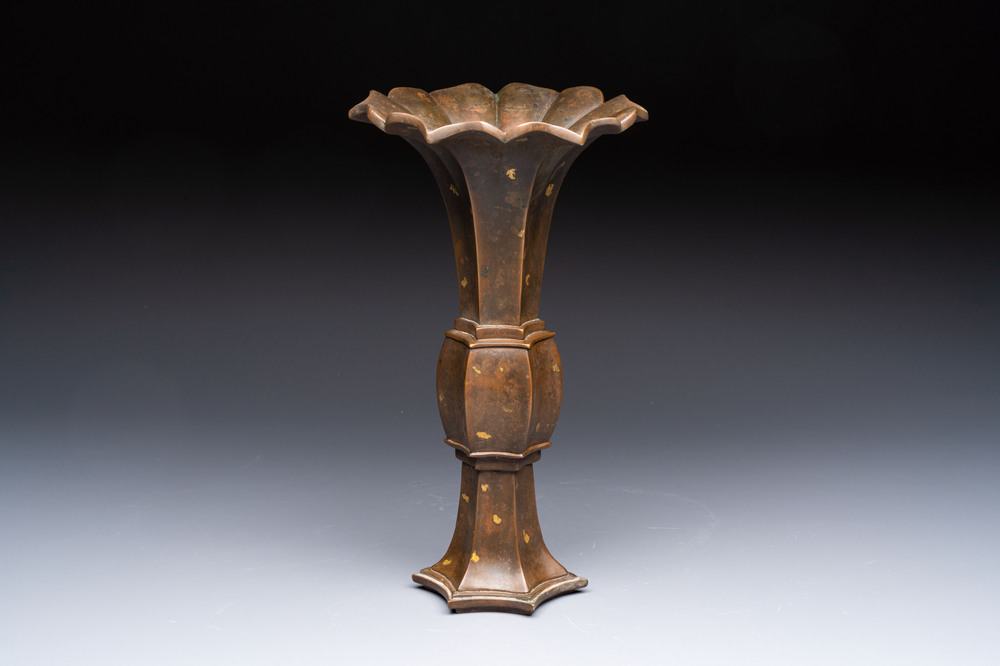 A Chinese gold-splashed bronze 'Gu' vase, Xuande mark, 17/18th C.