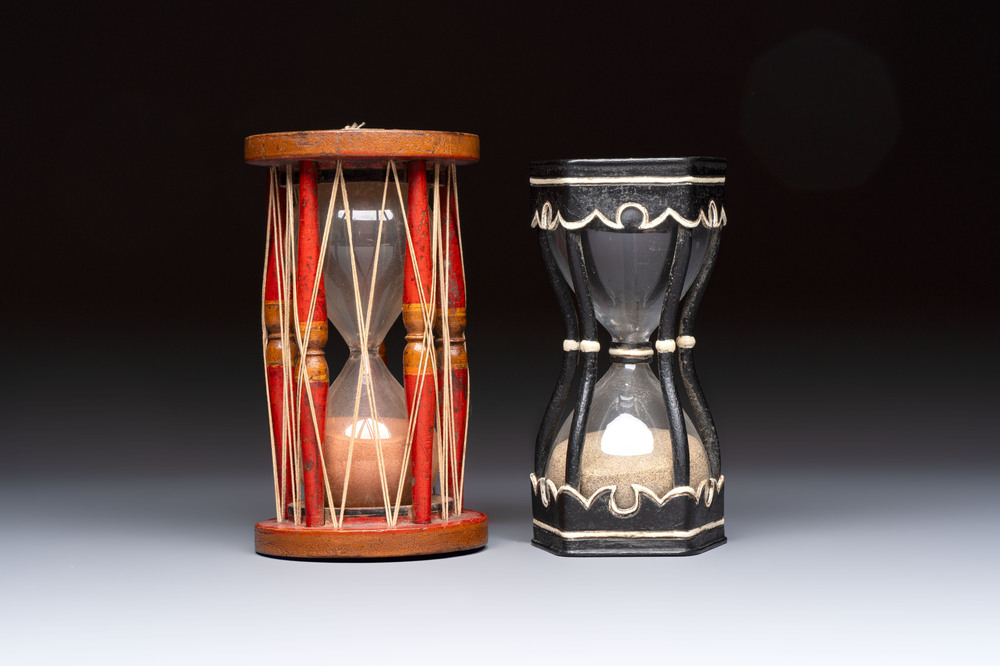 A wrought iron and a wooden hour glass, Germany and Italy, 19/20th C.