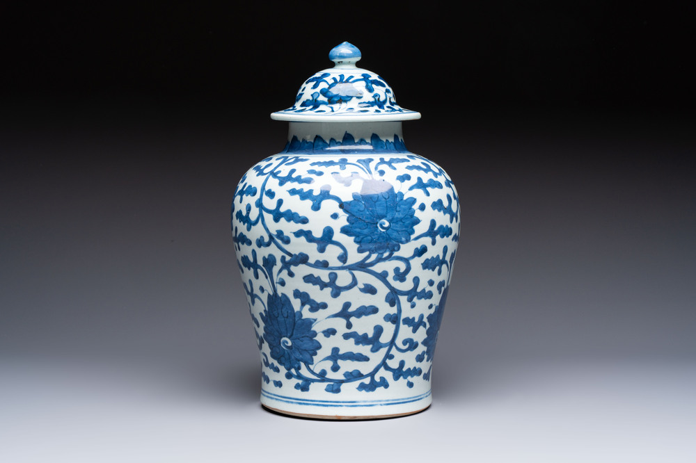 A Chinese blue and white vase and cover with floral design, Kangxi
