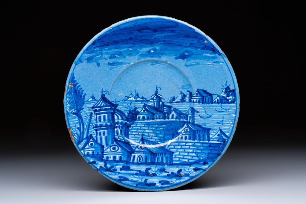 A fine and rare Italian maiolica 'Fortified Townscape' plate, Venice, dated 1627