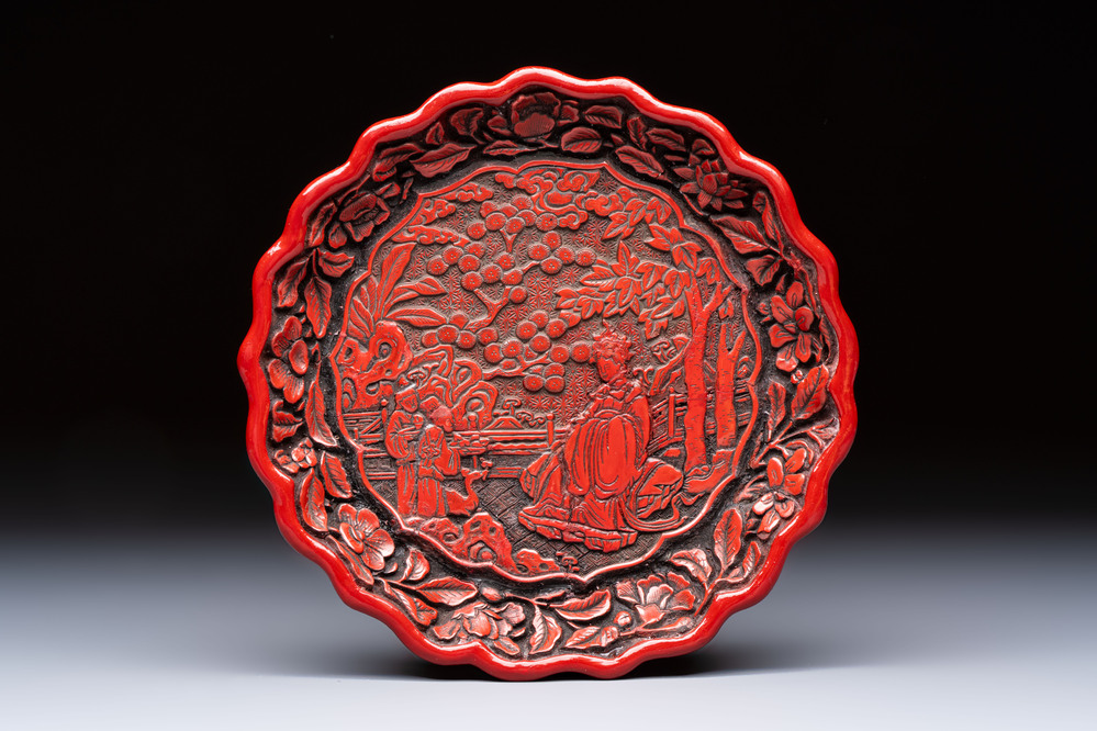 A fine Chinese red cinnabar lacquer flower-shaped 'Xi Wang Mu 西王母' dish, Ming