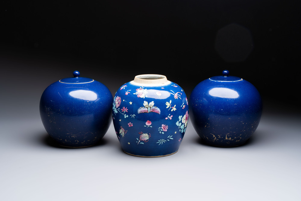 A pair of Chinese gilt-decorated powder-blue-ground covered jars and a famille rose powder-blue-ground jar, 18/19th C.