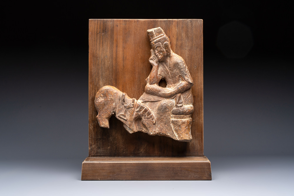 A Chinese sandstone 'Bai Ma Shi Zu 白馬舐足' carving, Northern Wei