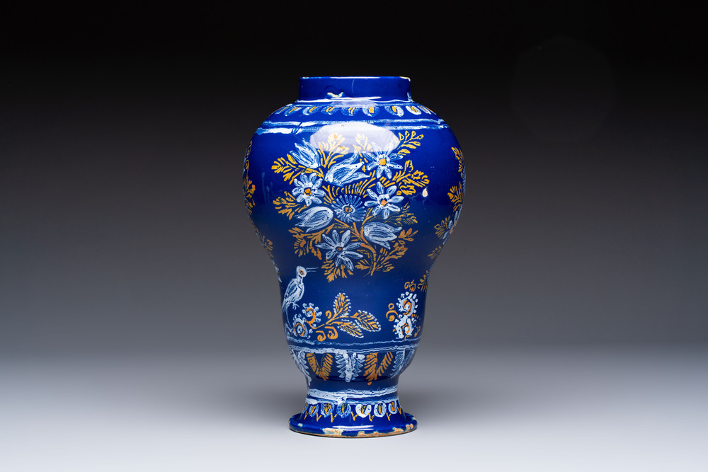 A Nevers blue-ground baluster vase with birds among flowering branches, France, 2nd half 17th C.