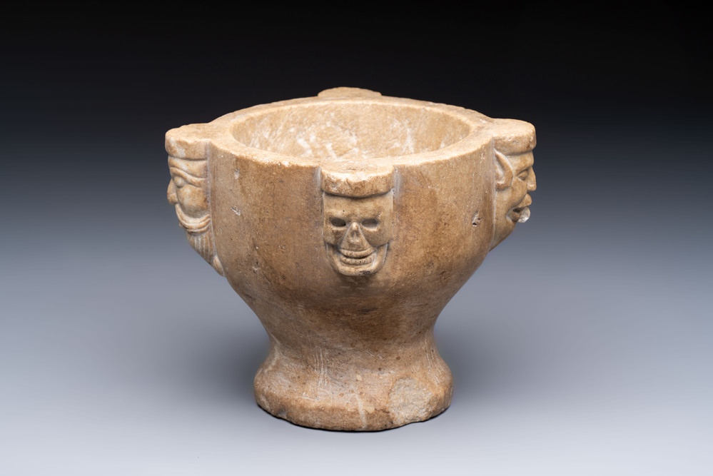 A rare Italian marble &lsquo;Poison Mortar&rsquo; with skulls and masks, 17th C.