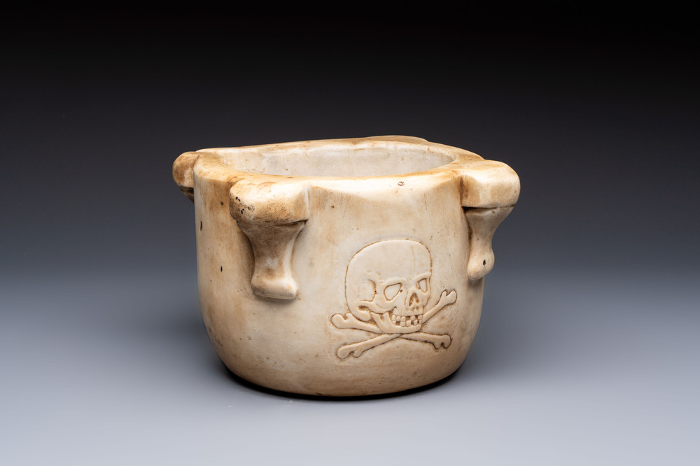 A large Italian carved marble 'Memento Mori' apothecary mortar, 17th C.