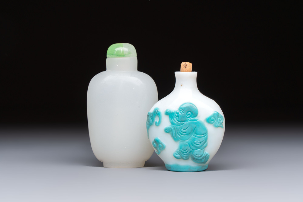 A Chinese turquoise-overlay white glass 'Fushou 福壽' snuff bottle and a glass imitating jade snuff bottle, Qianlong mark, 19th C.