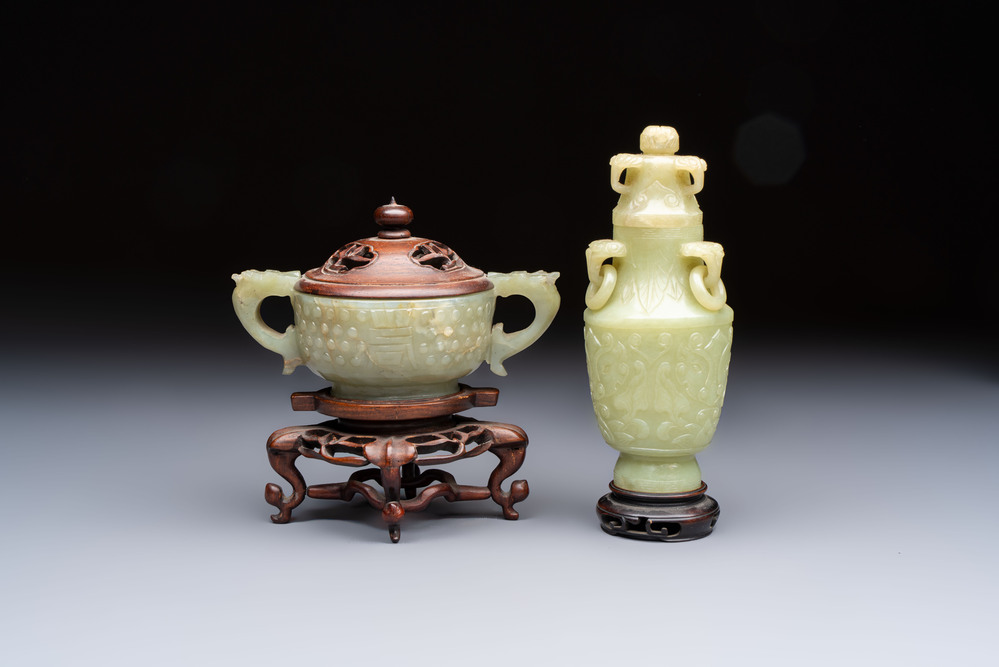 A Chinese celadon jade covered vase, with wooden stand, and a bowl with wooden cover and stand, 19/20th C.