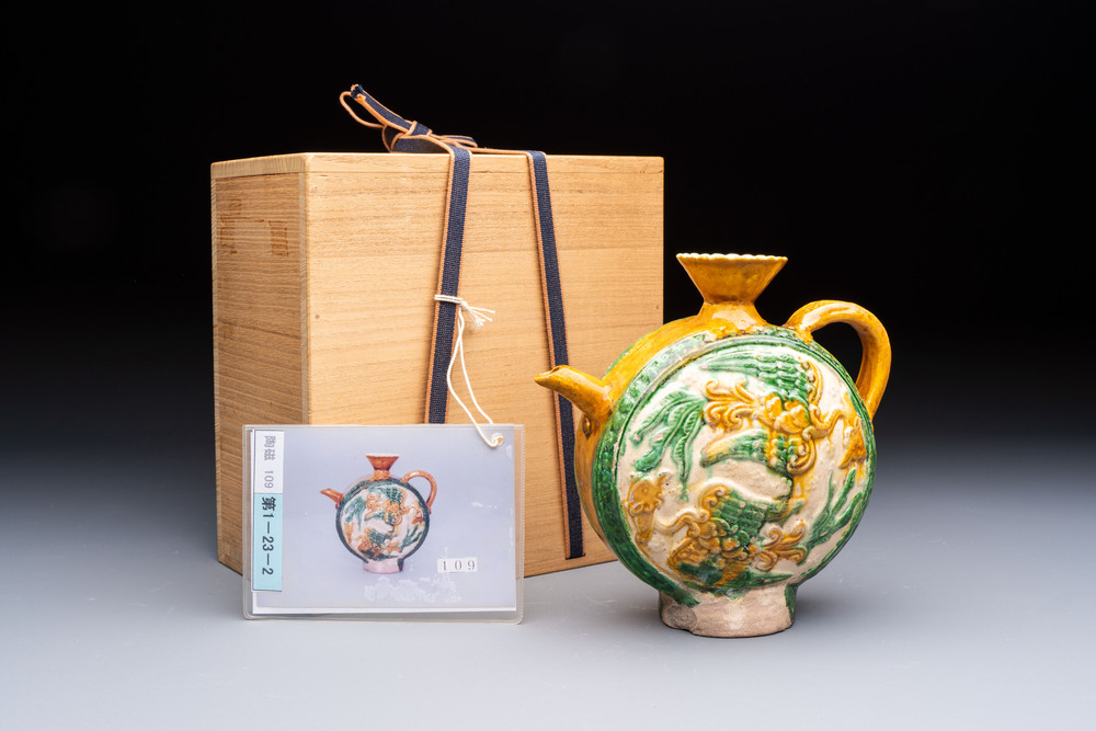 A rare Chinese sancai 'Phoenix' ewer with a wooden box, Liao
