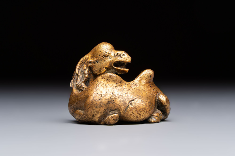 A Chinese gilt bronze 'Camel' paper weight, 19th C.