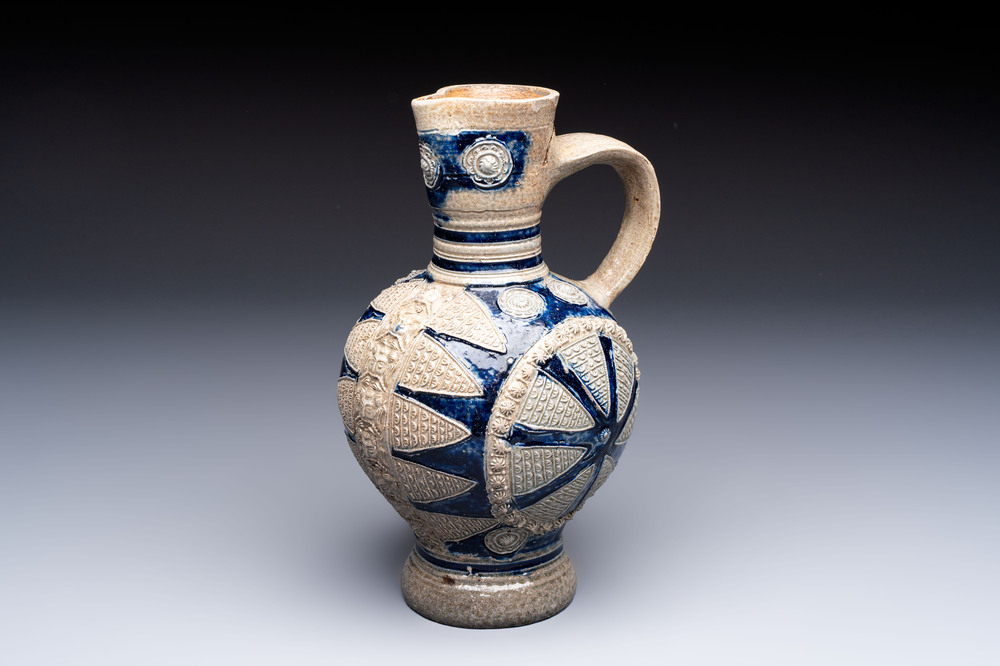 A Westerwald stoneware jug with moulded design, Germany, 17th C.