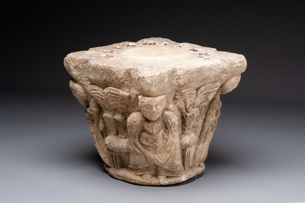A carved figurative sandstone capital, France or Spain, probably 14th C.