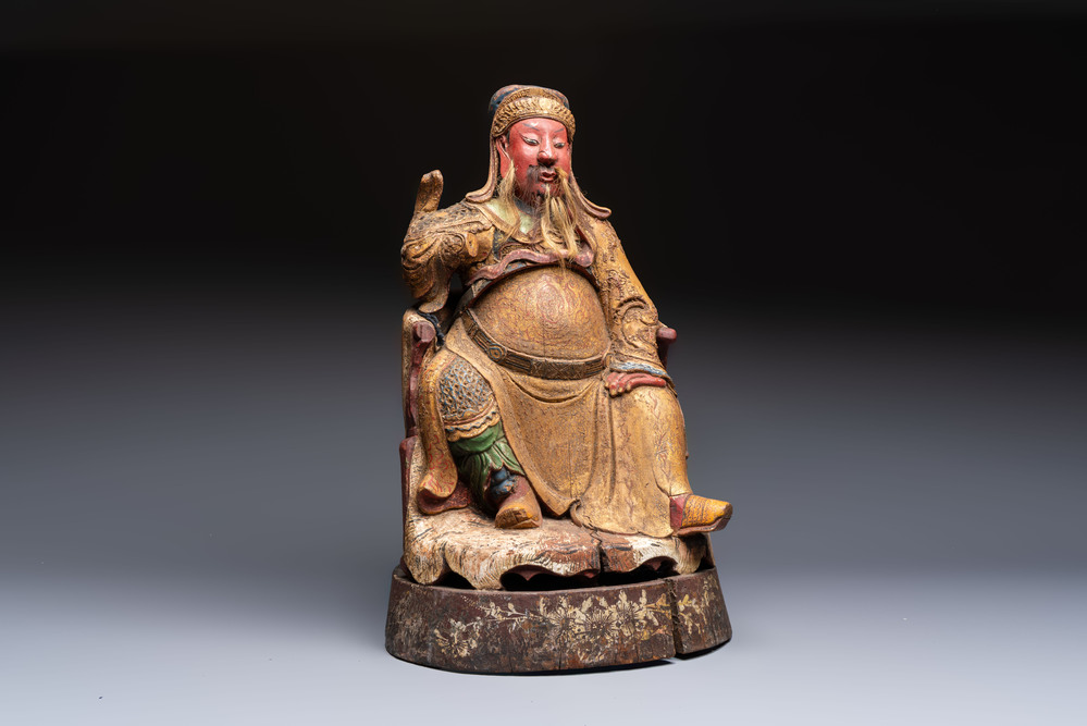 A large Chinese gilt-lacquered and polychrome wooden figure of Guandi, 19th C.