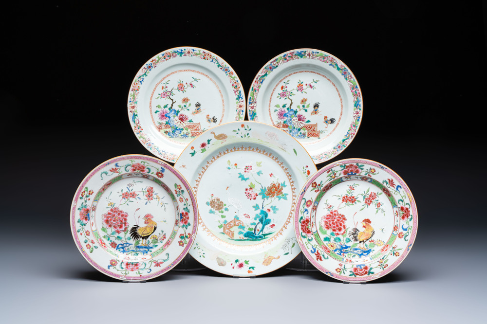 Four Chinese famille rose 'Roosters' plates and a 'Crane' dish, Qianlong