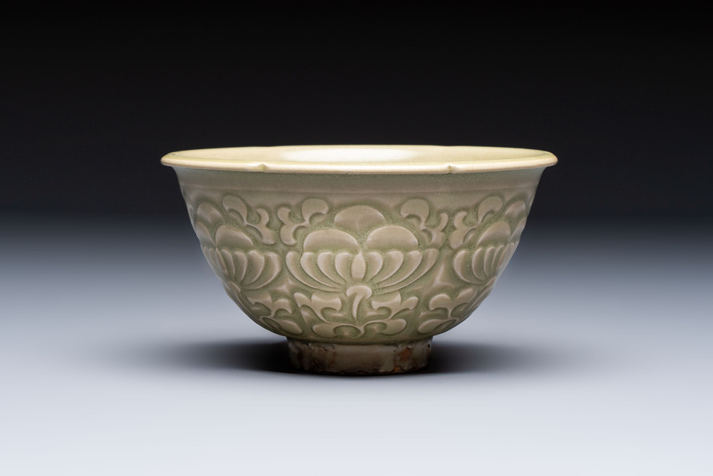 A Chinese carved Yaozhou celadon-glazed bowl with floral design, Jin