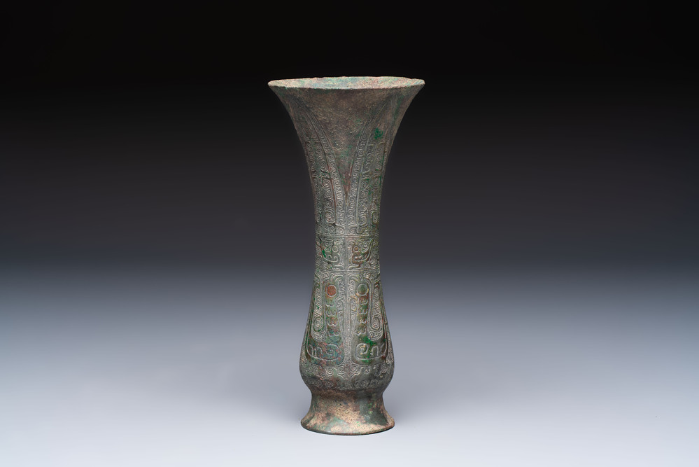 A Chinese archaic bronze wine vessel with phoenix design, Zhi 觯, Zhou