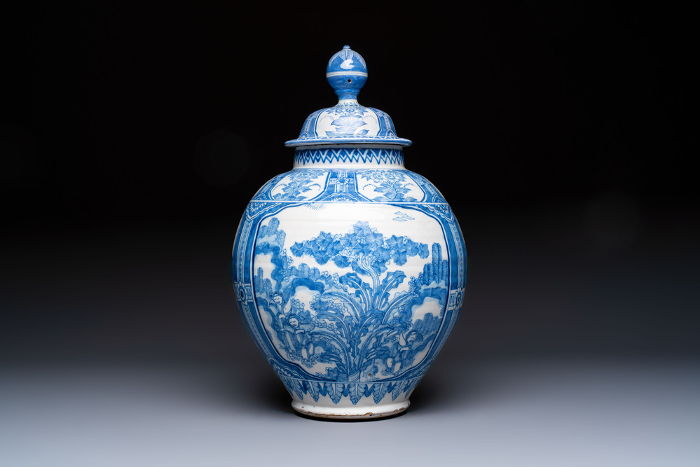 A large blue and white Dutch Delft chinoiserie vase and cover, 17th C.