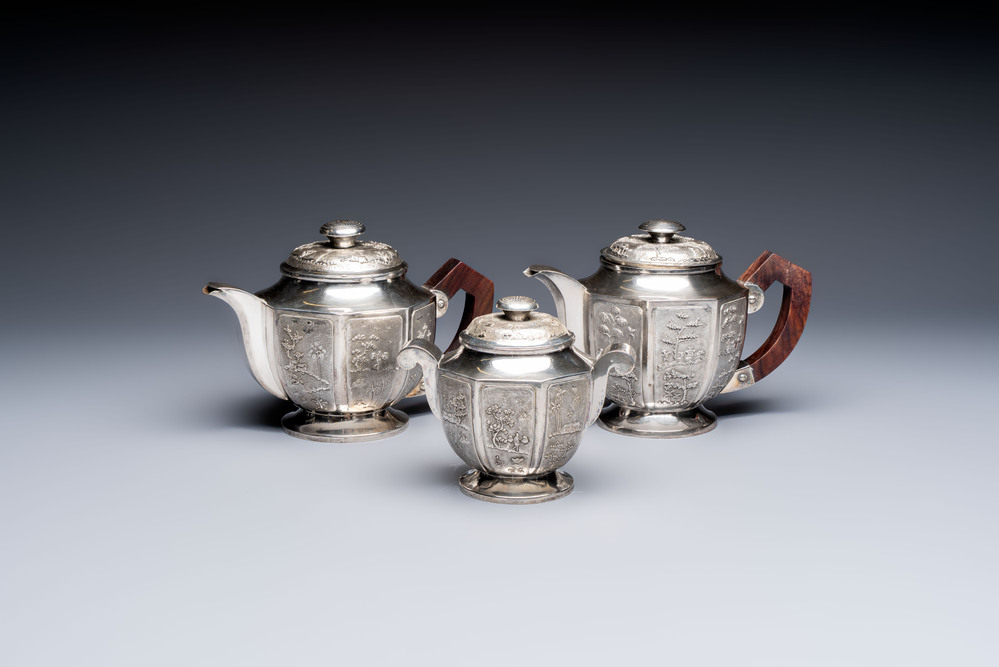 Two Vietnamese silver teapots and a covered sugar bowl, marked Donghung, ca. 1900