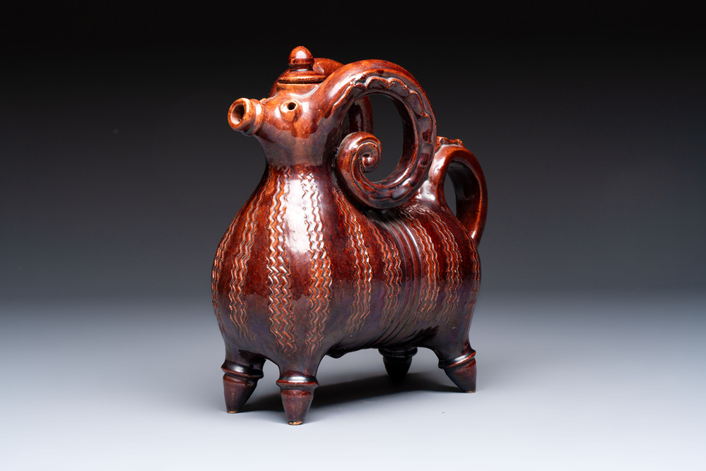 A brown-glazed stoneware ewer and cover in the shape of a ram, impressed mark, Opishne, Ukraine, early 20th C.