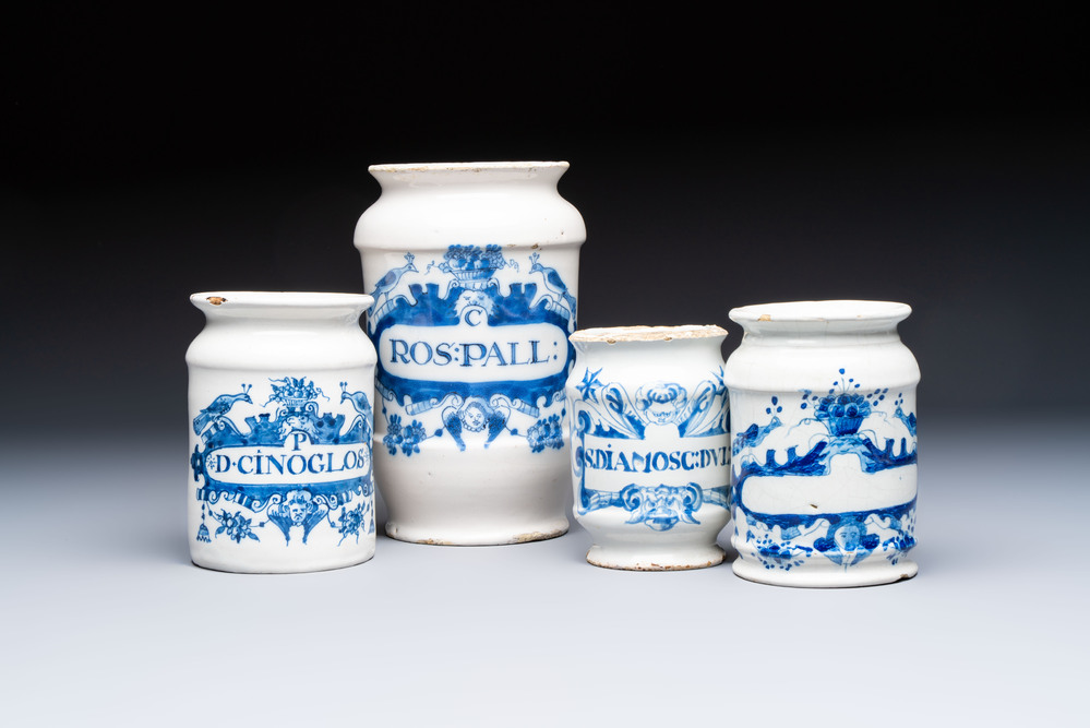 Four blue and white Dutch Delft pharmacy jars, 18th C.