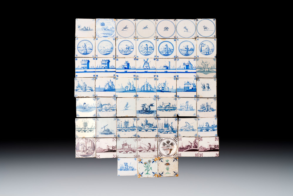 A varied collection of 52 blue, white and polychrome Dutch Delft tiles, 17/19th C.