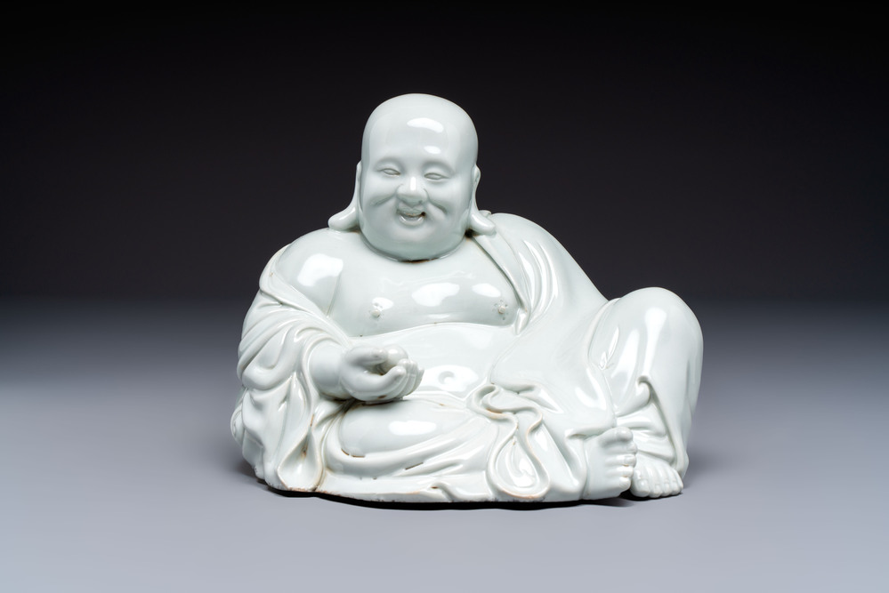 A fine Chinese white-glazed Milefo Buddha, 19th C.