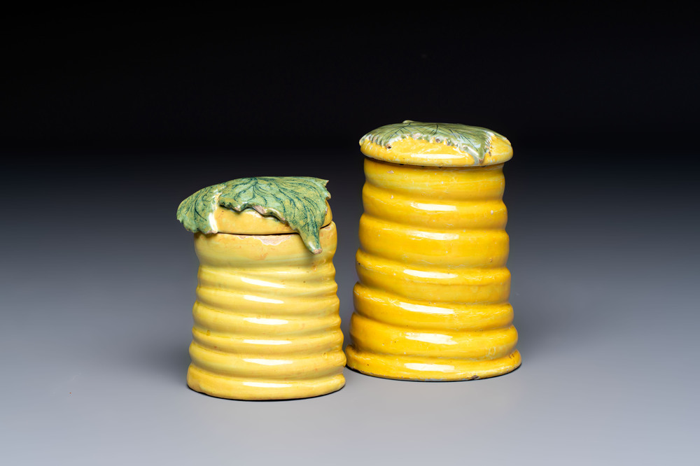 Two rare polychrome Dutch Delft honey pots and covers, 18th C.