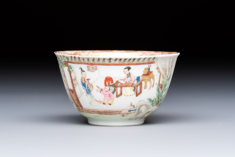 A Chinese Canton famille rose 'Court Ladies and Playing Boy' cup, Yongzheng/Qianlong