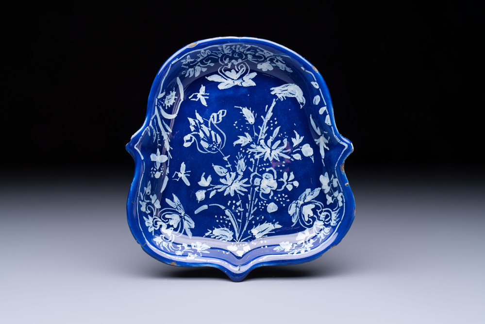 An extremely rare Dutch Delft 'Persian Blue' shield-shaped condiment dish, late 17th C.