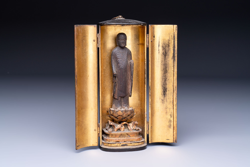 A small Japanese gilt-lacquered wooden zushi shrine with a carved wooden monk, probably Edo, 18/19th C.