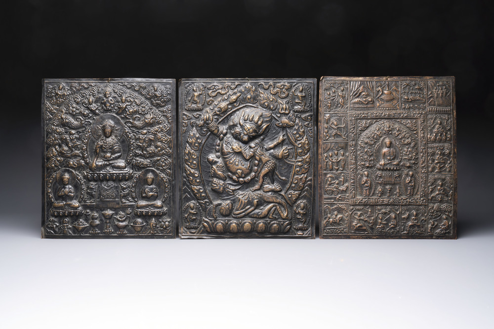 Three Tibetan copper repouss&eacute; plaques with Buddhist subjects, 19th C.