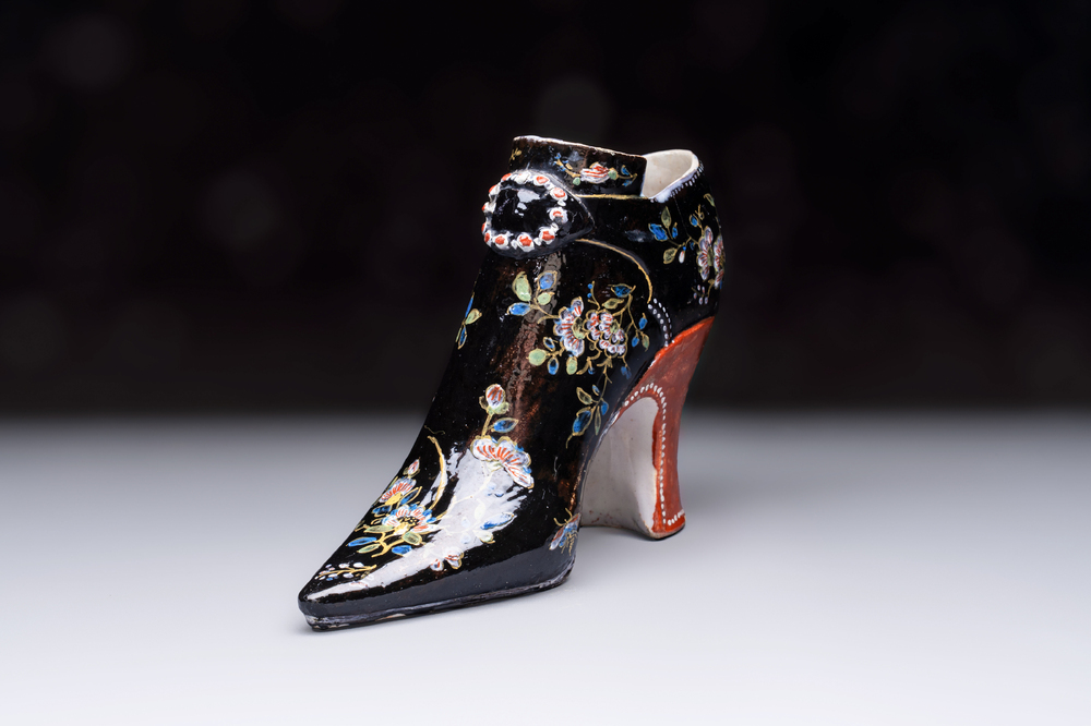 An extremely rare black Delftware model of a shoe, early 18th C.