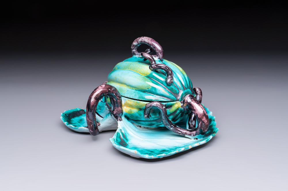 A very rare Brussels faience melon-shaped tureen and cover on stand, 18th C.